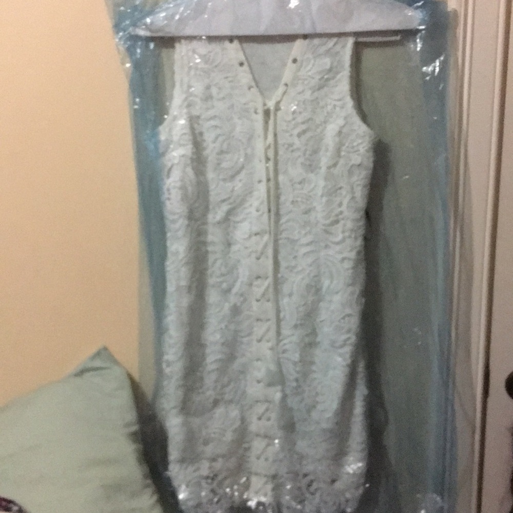Brand spanking new white laced dress